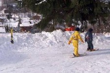 First timers in Megève, learning to slide on the gentle slopes